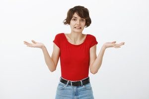 Woman shrugging, not sure how to answer "how's the job search going"