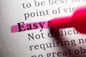 Pen highlighting the word "easy," the key quality of a readable resume.
